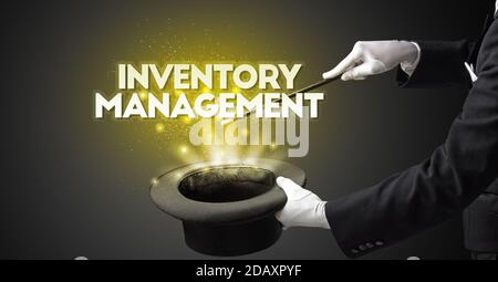Illusionist is showing magic trick with INVENTORY MANAGEMENT ...