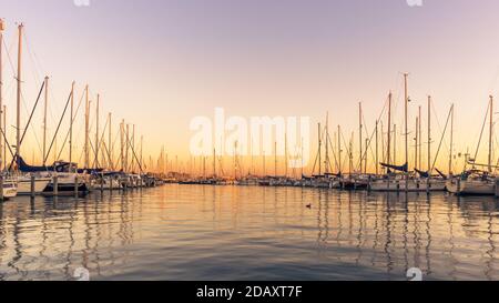 Dutch harbour with sailing boats at sunrise in silence Stock Photo