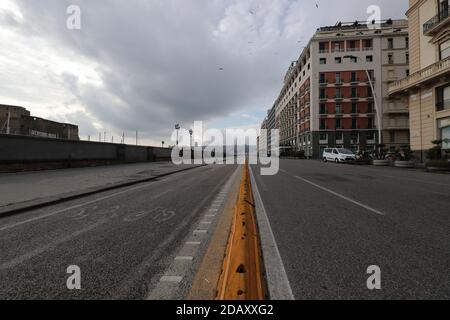 Naples, Italy. 15th Nov, 2020. View of the empty Caracciolo street on seafront. From 15 November Campania region is in the red zone with the highest level of restrictions. Credit: Independent Photo Agency/Alamy Live News Stock Photo