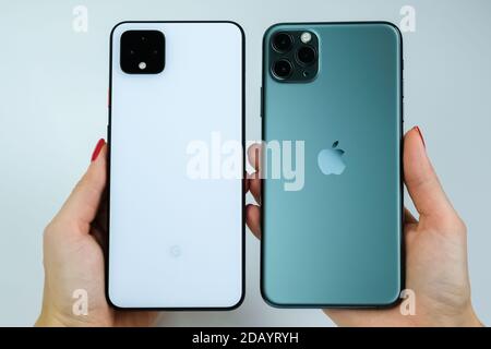 Google Pixel 4 Xl In Clearly White Color And Iphone 11 Pro Max In Midnight Green Stock Photo Alamy