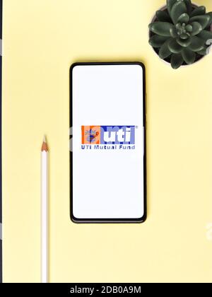 Assam, india - November 15, 2020 : UTI logo on phone screen stock image. Stock Photo