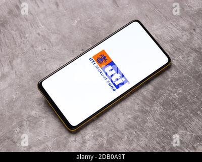 Assam, india - November 15, 2020 : UTI logo on phone screen stock image. Stock Photo