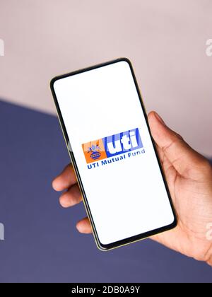 Assam, india - November 15, 2020 : UTI logo on phone screen stock image. Stock Photo