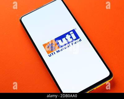 Assam, india - November 15, 2020 : UTI logo on phone screen stock image. Stock Photo