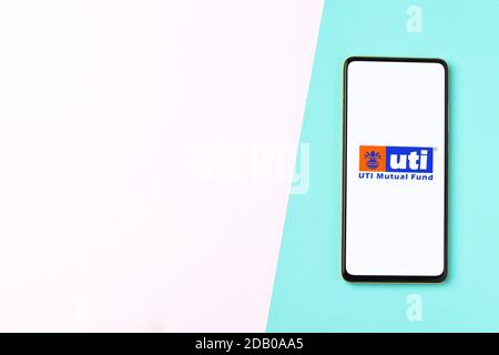 Assam, india - November 15, 2020 : UTI logo on phone screen stock image. Stock Photo