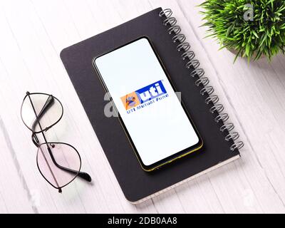 Assam, india - November 15, 2020 : UTI logo on phone screen stock image. Stock Photo