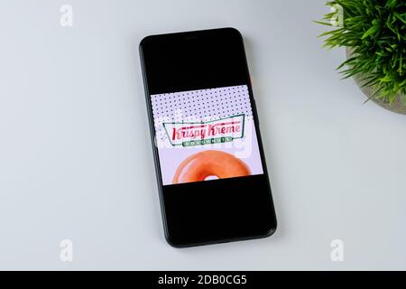 Krispy Kreme app logo on a smartphone screen. Stock Photo