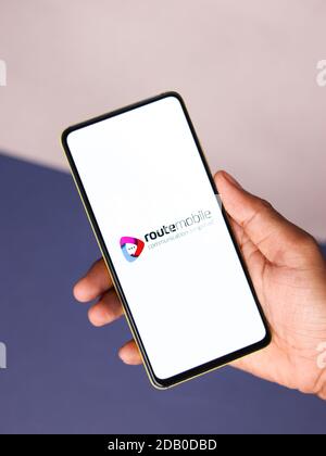 Assam, india - November 15, 2020 : Route Mobile logo on phone screen stock image. Stock Photo