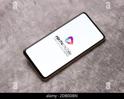 Assam, india - November 15, 2020 : Route Mobile logo on phone screen stock image. Stock Photo