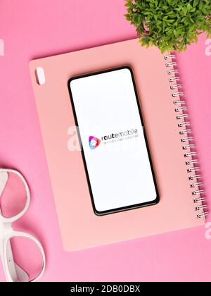 Assam, india - November 15, 2020 : Route Mobile logo on phone screen stock image. Stock Photo