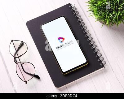 Assam, india - November 15, 2020 : Route Mobile logo on phone screen stock image. Stock Photo