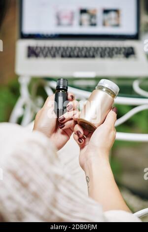 Woman ordered cosmetics online Stock Photo