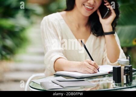 Business lady talking on phone Stock Photo