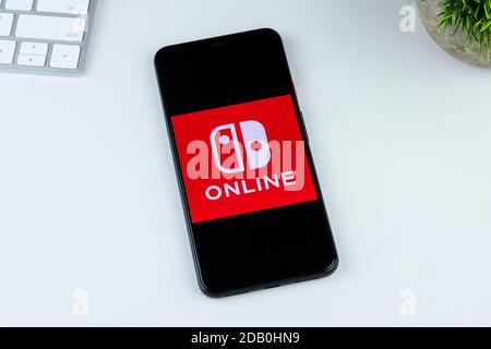 Nintendo Switch Online app logo on a smartphone screen. Stock Photo