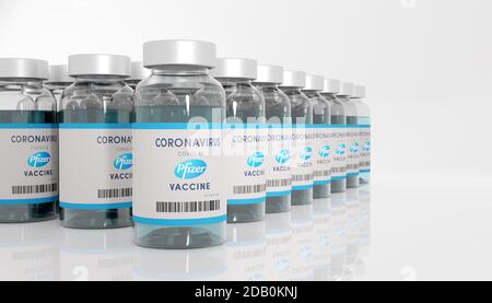 Guilherand-Granges, France - November 16, 2020. Covid-19 vaccine with Pfizer logo. American multinational pharmaceutical corporation. Stock Photo