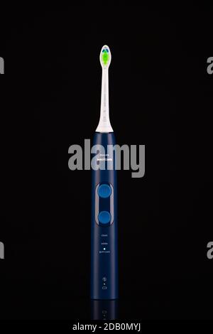 Prague,Czech Republic - 6 November,2020: Philips Sonicare electric toothbrush on an isolated black background. Stock Photo