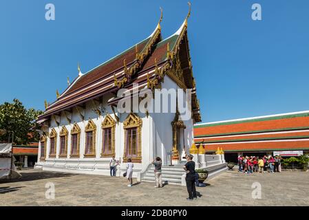 Bangkok, Thailand - December 7, 2019: Unidentified foreign tourists take pictures inside Grand palace and Wat Phra Kaew at Bangkok, Thailand. Amazing