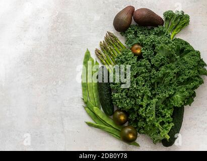 Green vegetables and leafy food background. Healthy eating green concept of fresh organic products. Stock Photo