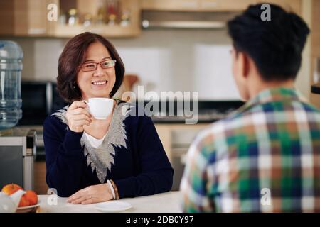 Mother talking to son Stock Photo