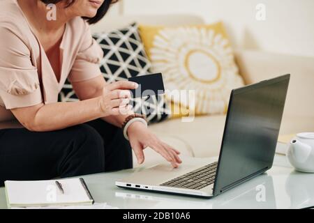 Woman shopping online Stock Photo
