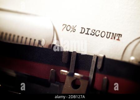 70 % discount text written on a paper. Stock Photo