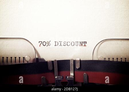 70 % discount text written on a paper. Stock Photo