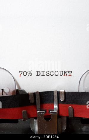 70 % discount text written on a paper. Stock Photo