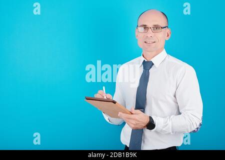 Manager writing on tablet Stock Photo