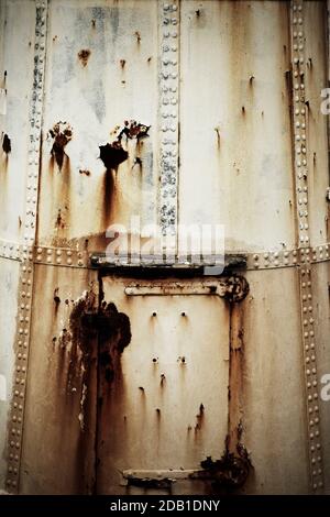 Rusty riveted steel plates on Thorngumbald lighthouse (1870), East Riding of Yorkshire, UK. Stock Photo