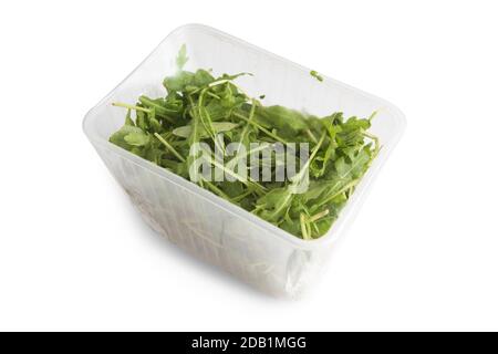 Arugula in plastic bag Stock Photo