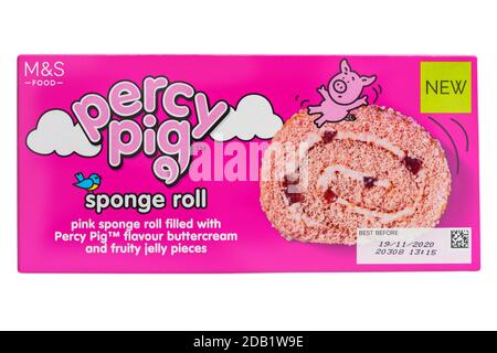 M&S Percy Pig sponge roll cake in box set on white background - pink sponge roll filled with Percy Pig flavour buttercream and fluffy jelly pieces Stock Photo