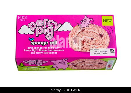 M&S Percy Pig sponge roll cake in box set on white background - pink sponge roll filled with Percy Pig flavour buttercream and fluffy jelly pieces Stock Photo