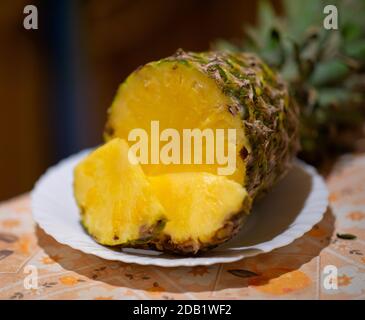 Fresh pineapple fruit on a white plate Stock Photo