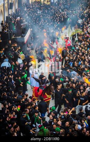 Nakhl Gardani is a religious ritual carried out on the day of Ashura for commemorating the death of Imam Husayn. / Yazd, Iran Stock Photo