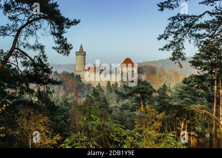 View of old stone Kokorin Castle built in 14th century.It lies in the middle of a nature reserve on a steep rocky spur above the Kokorin Valley Stock Photo