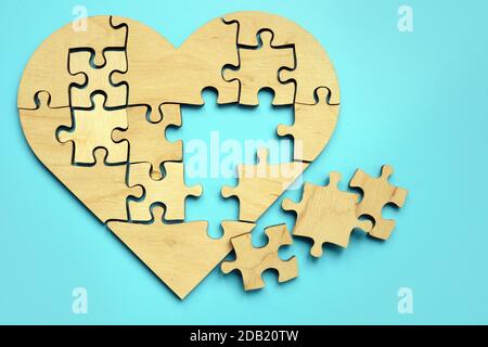 Heart made from puzzle pieces. Disease and treatment symbol. Stock Photo