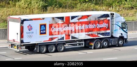 Aldi food supply chain retail supermarket business delivery lorry truck & trailer advertising union flag graphics Great British quality motorway uk Stock Photo