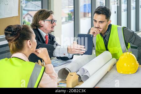 Group of Caucasian engineer teamwork meeting for planning project. Corporation creativity people. Stock Photo
