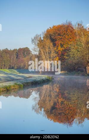 Autumn scenery is reflected in the water at Heichi Dam scenic area of ...