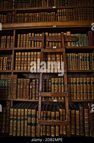 GREAT BRITAIN / England /Derbyshire/Ashbourne/ Tissington Hall /The Library boasts a collection of over 3,000 books Stock Photo