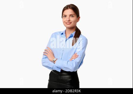 Confident crossed arms business woman in blue shirt on white isolated background Stock Photo