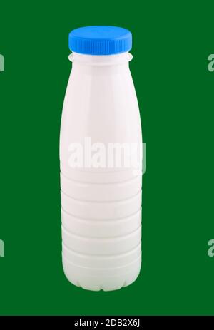 plastic yogurt bottle, isolated on green background Stock Photo