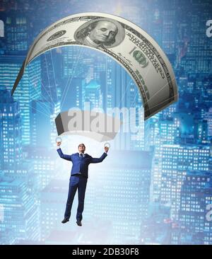 The businessman in golden parachute concept Stock Photo