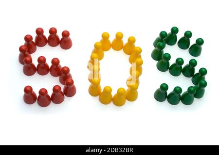 Pawns and forming the word “SOS”, isolated on a white background Stock Photo