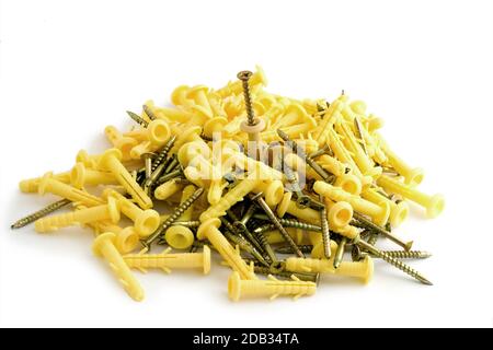 Screws and dowels for concrete wall isolated on white background Stock Photo