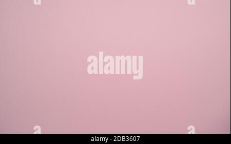 Paper texture in pink with space for text, Mother’s Day or Valentines Day background Stock Photo