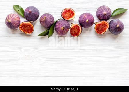 Flat lay of figs on a kitchen table, top view Stock Photo