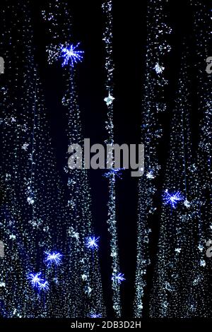 Night sky decoration on city streets with blue lights and lantern lamps Stock Photo