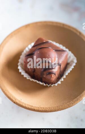 Individual Iced Fondant Chocolate Cakes Stock Photo