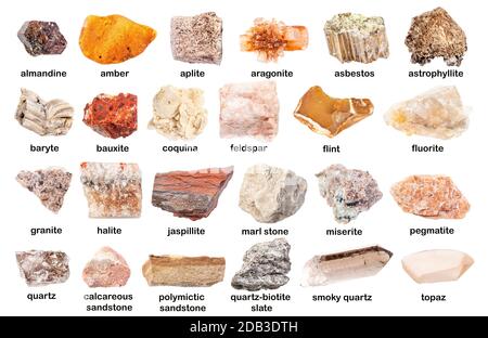 set of various unpolished stones with names (asbestos, fluorite, aplite, smoky quartz, feldspar, bauxite, astrophyllite, baryte, quartz-biotite slate, Stock Photo